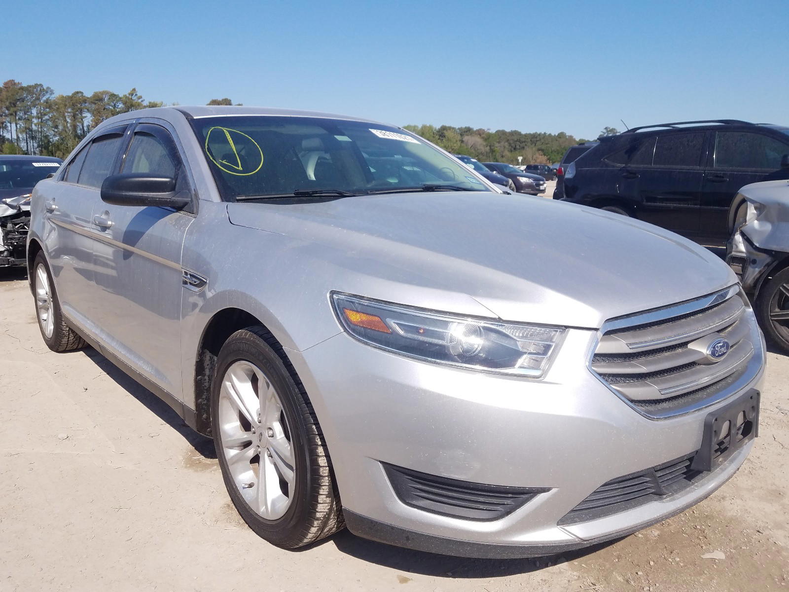 FORD TAURUS SE 2015 with VIN 1FAHP2D81FG155334 - Photo from auction