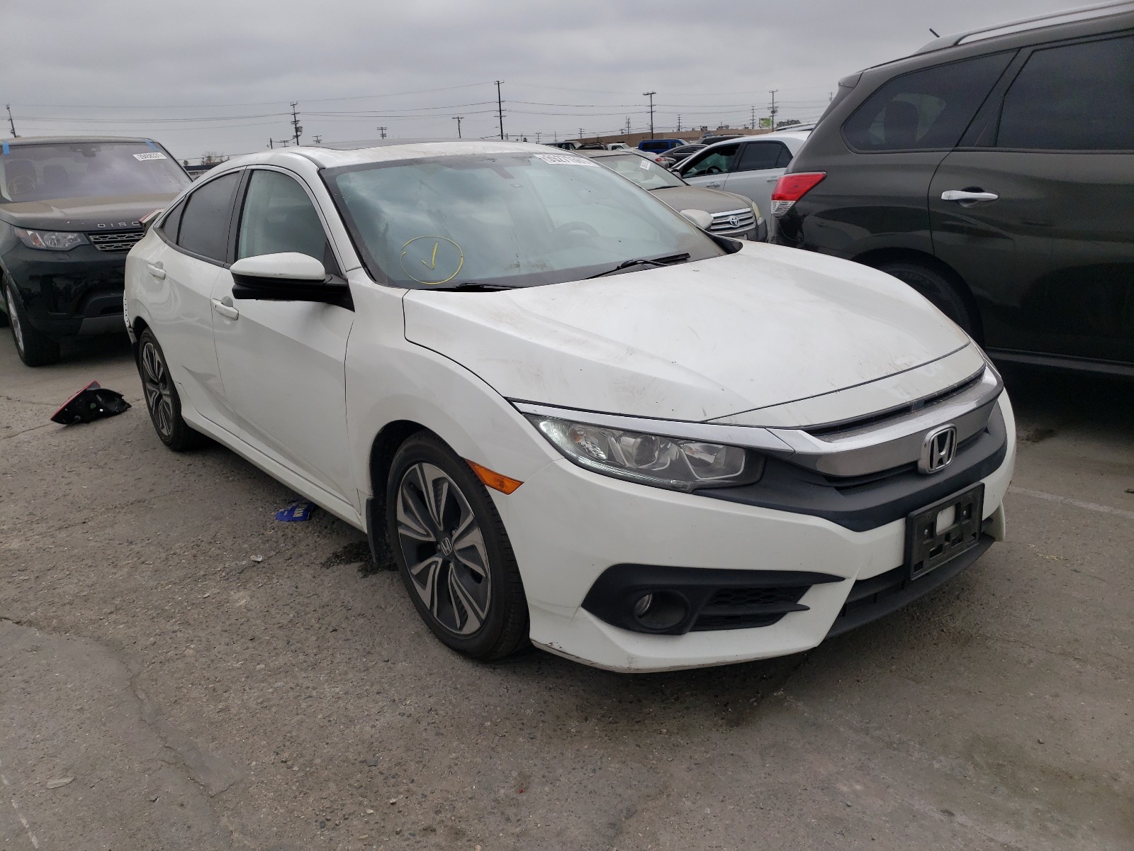 Photo 1 from auction – 2016 HONDA CIVIC EX with VIN 2HGFC1F34GH652491