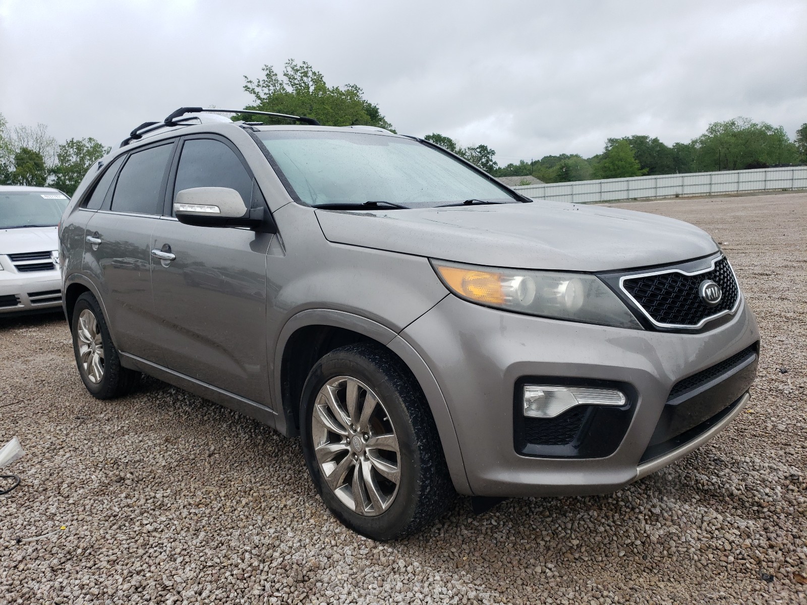 Photo 1 from auction – 2012 KIA SORENTO SX with VIN 5XYKW4A23CG231679