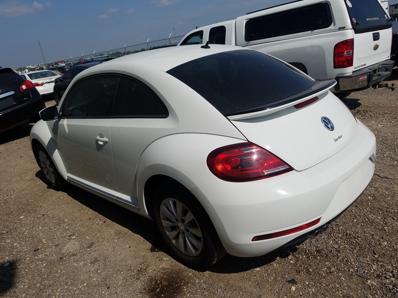 Photo 3 from auction – 2019 VOLKSWAGEN BEETLE S with VIN 3VWFD7AT7KM710316