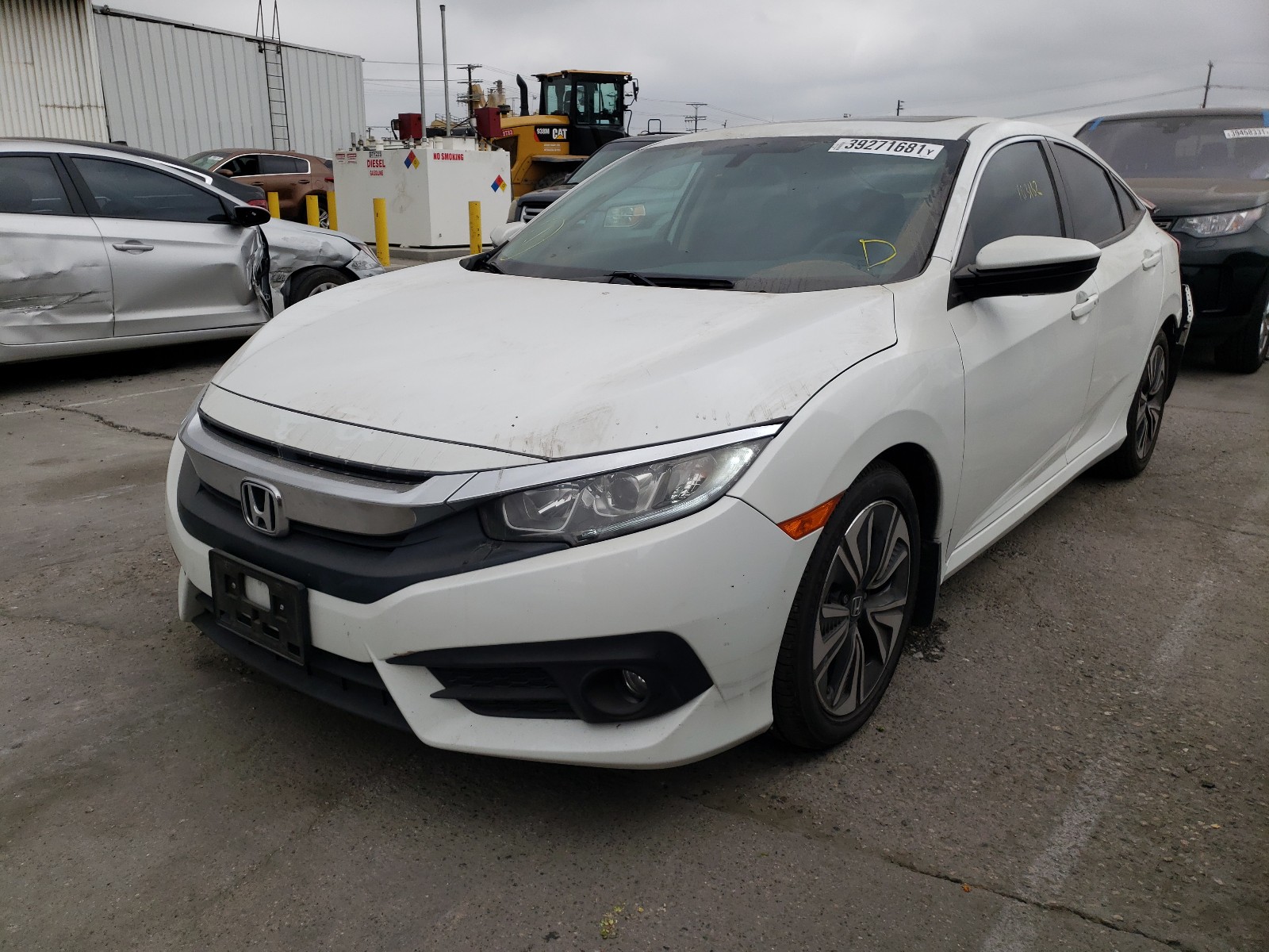 Photo 2 from auction – 2016 HONDA CIVIC EX with VIN 2HGFC1F34GH652491