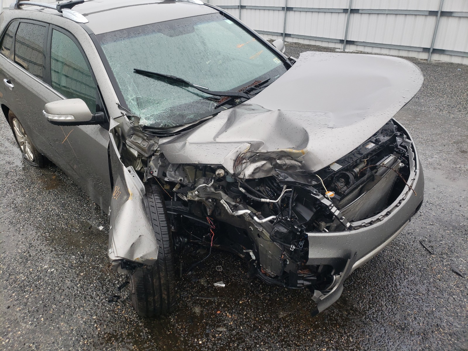 Photo 9 from auction – 2012 KIA SORENTO SX with VIN 5XYKWDA29CG232478