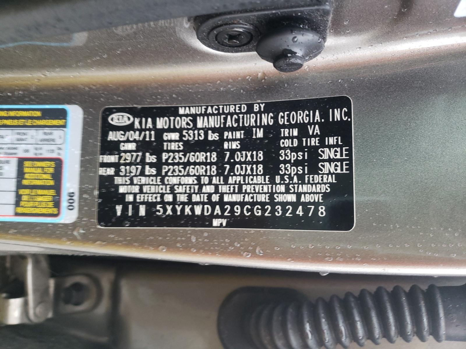 Photo 10 from auction – 2012 KIA SORENTO SX with VIN 5XYKWDA29CG232478