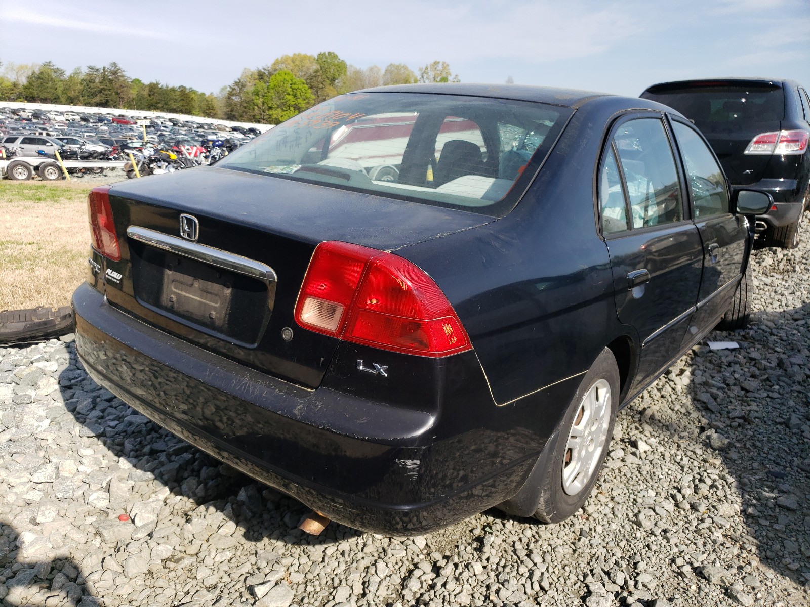 Photo 4 from auction – 2002 HONDA CIVIC LX with VIN 1HGES16562L045939