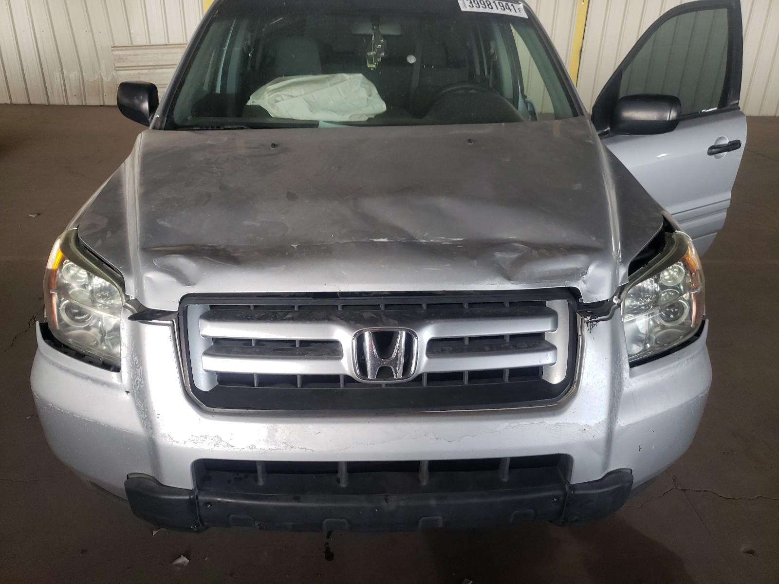 Photo 7 from auction – 2006 HONDA PILOT LX with VIN 5FNYF28186B051489