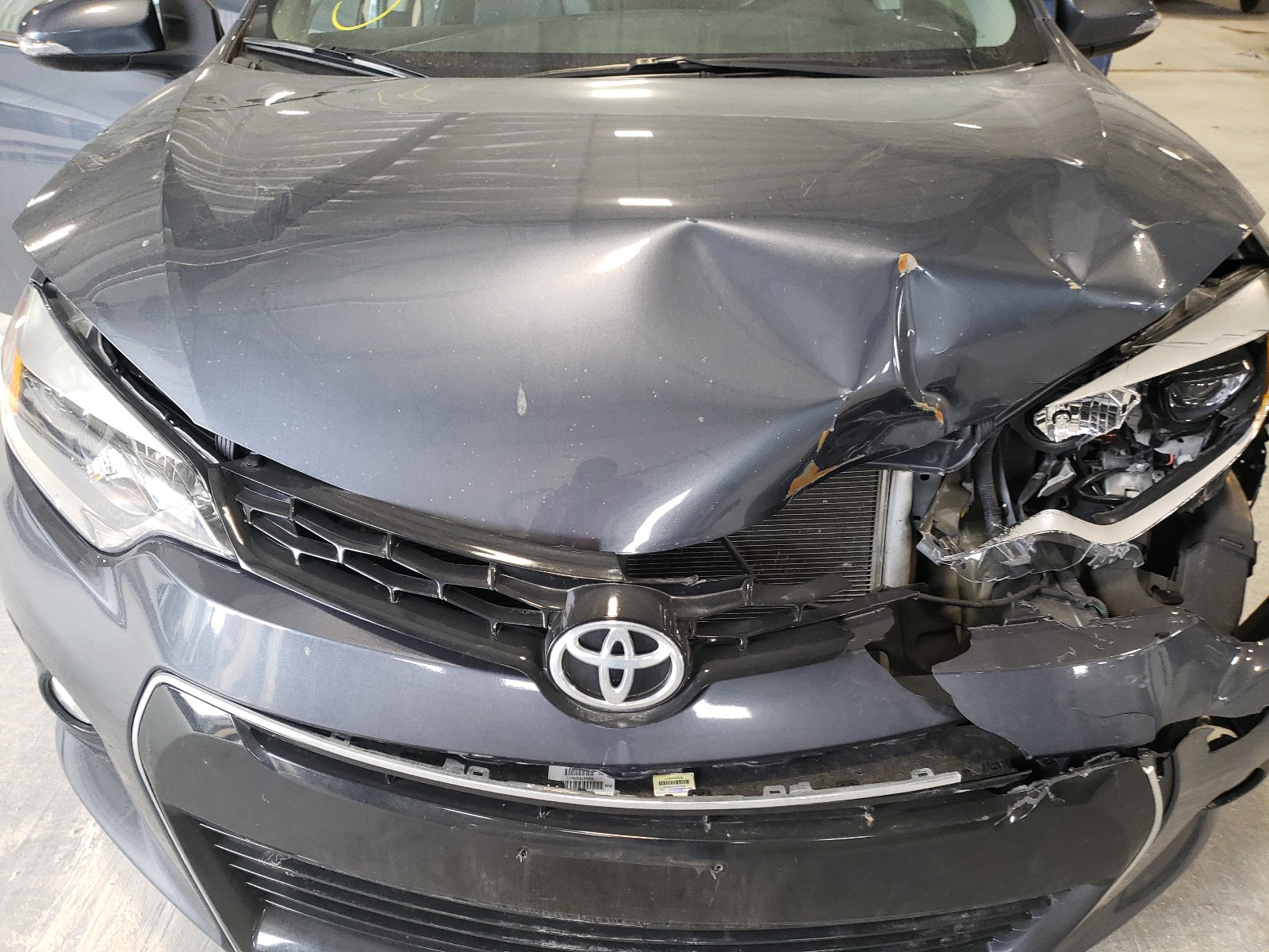 Photo 7 from auction – 2015 TOYOTA COROLLA L with VIN 5YFBURHE3FP352456