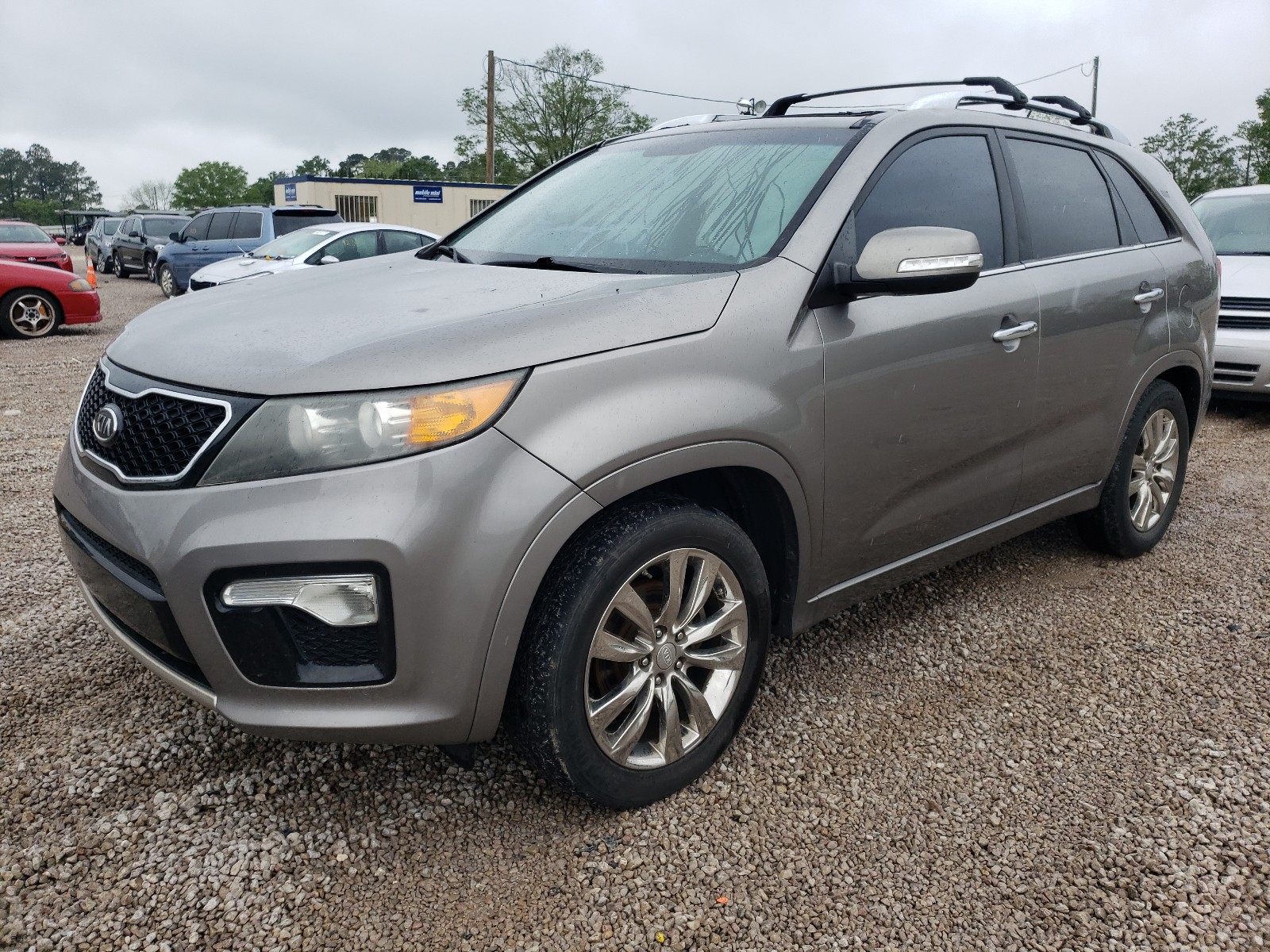 Photo 2 from auction – 2012 KIA SORENTO SX with VIN 5XYKW4A23CG231679