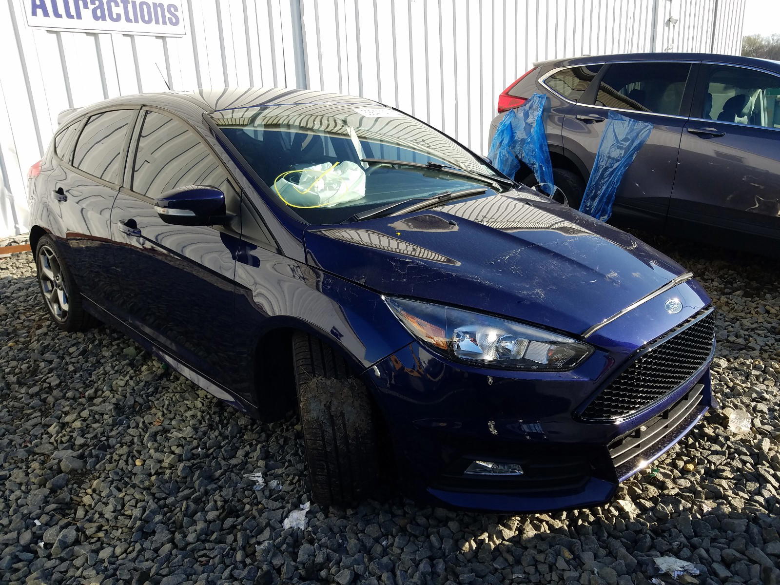 FORD FOCUS ST 2017 with VIN 1FADP3L99HL202649 - Photo from auction