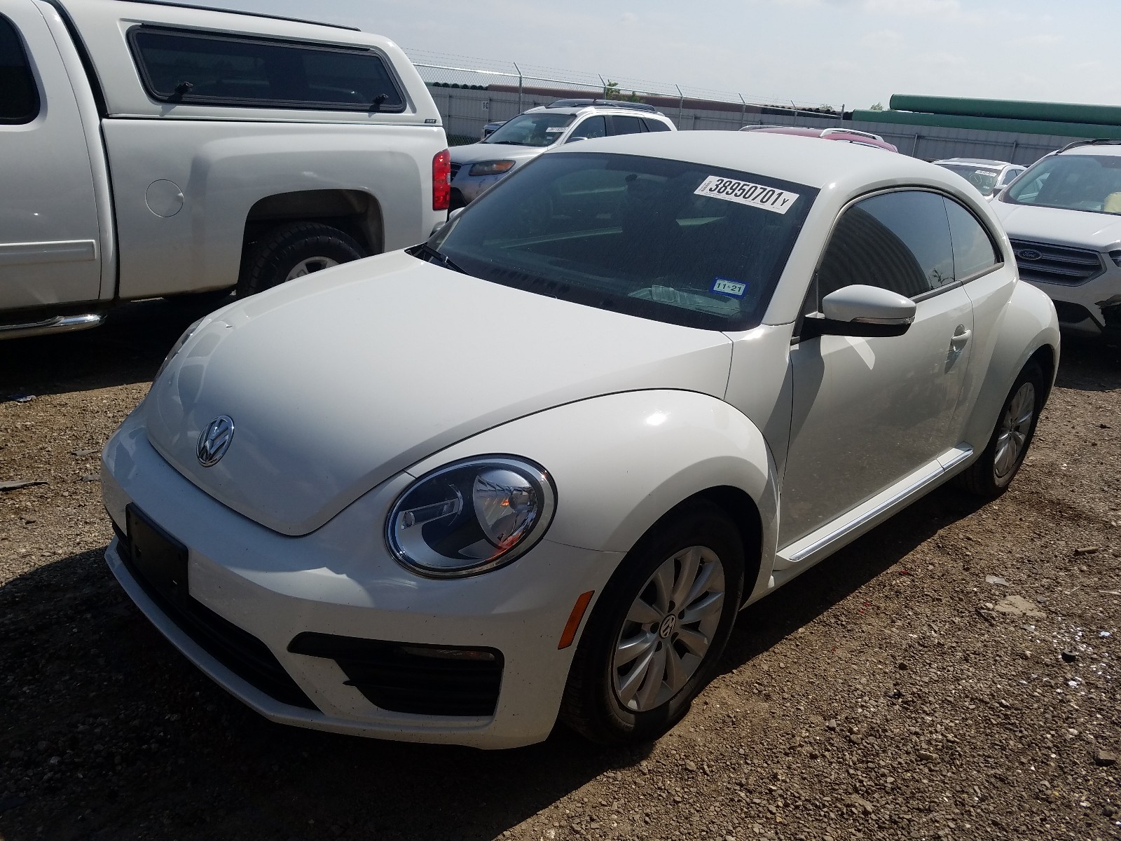 Photo 2 from auction – 2019 VOLKSWAGEN BEETLE S with VIN 3VWFD7AT7KM710316