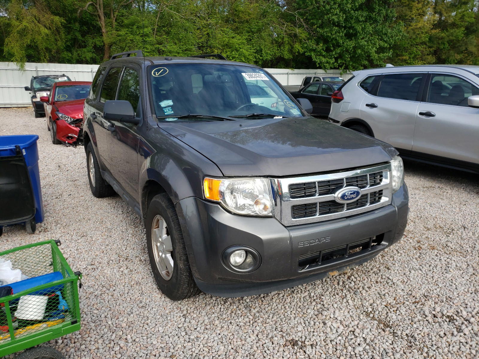 FORD ESCAPE XLT 2011 with VIN 1FMCU0D75BKC59630 - Photo from auction