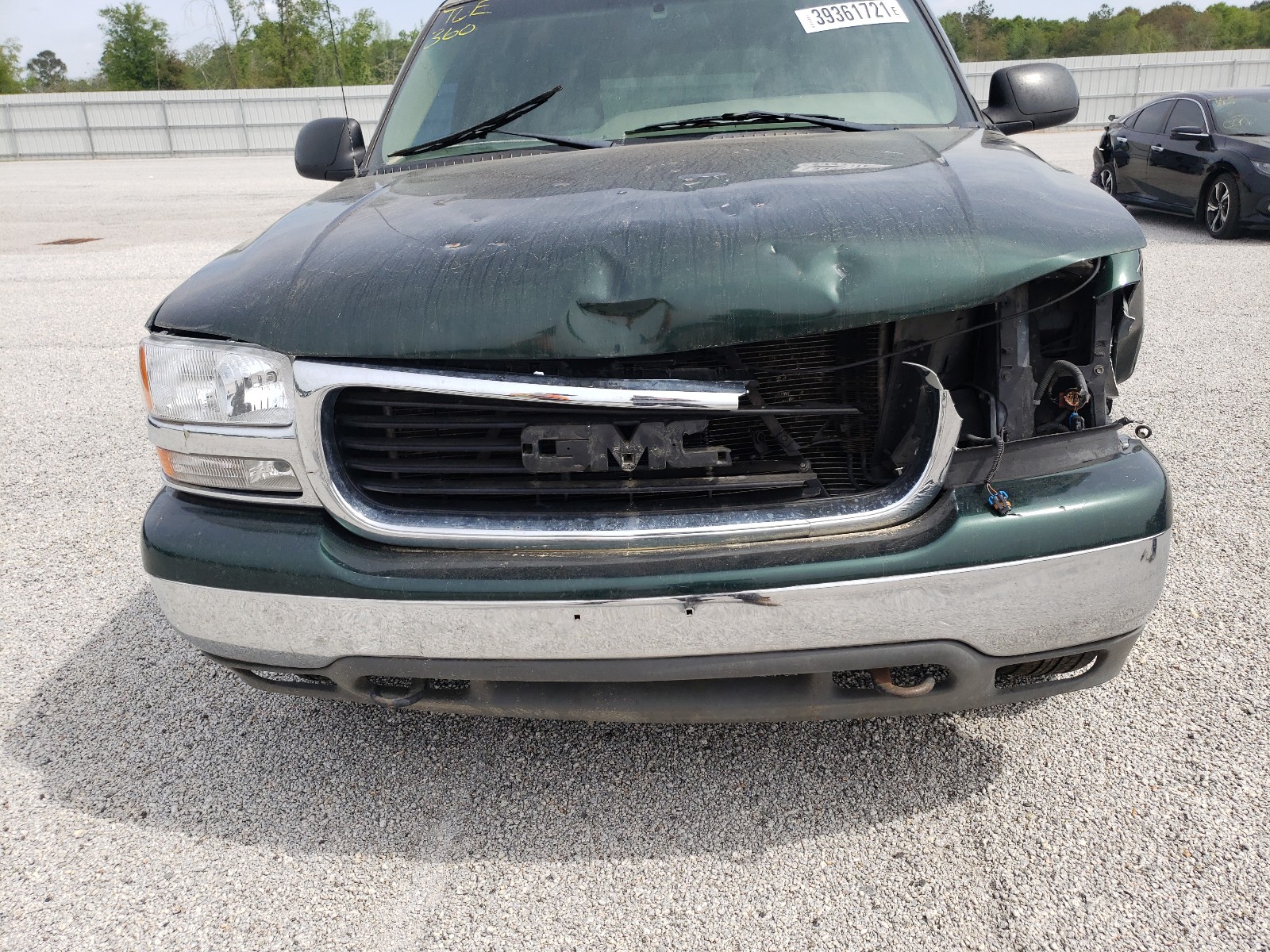 Photo 9 from auction – 2002 GMC YUKON with VIN 1GKEC13V82R236943