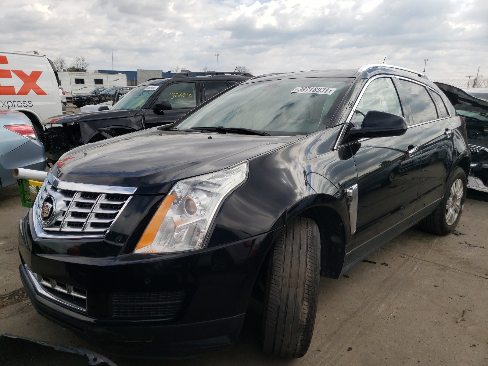 Photo 2 from auction – 2015 CADILLAC SRX LUXURY with VIN 3GYFNEE33FS580867