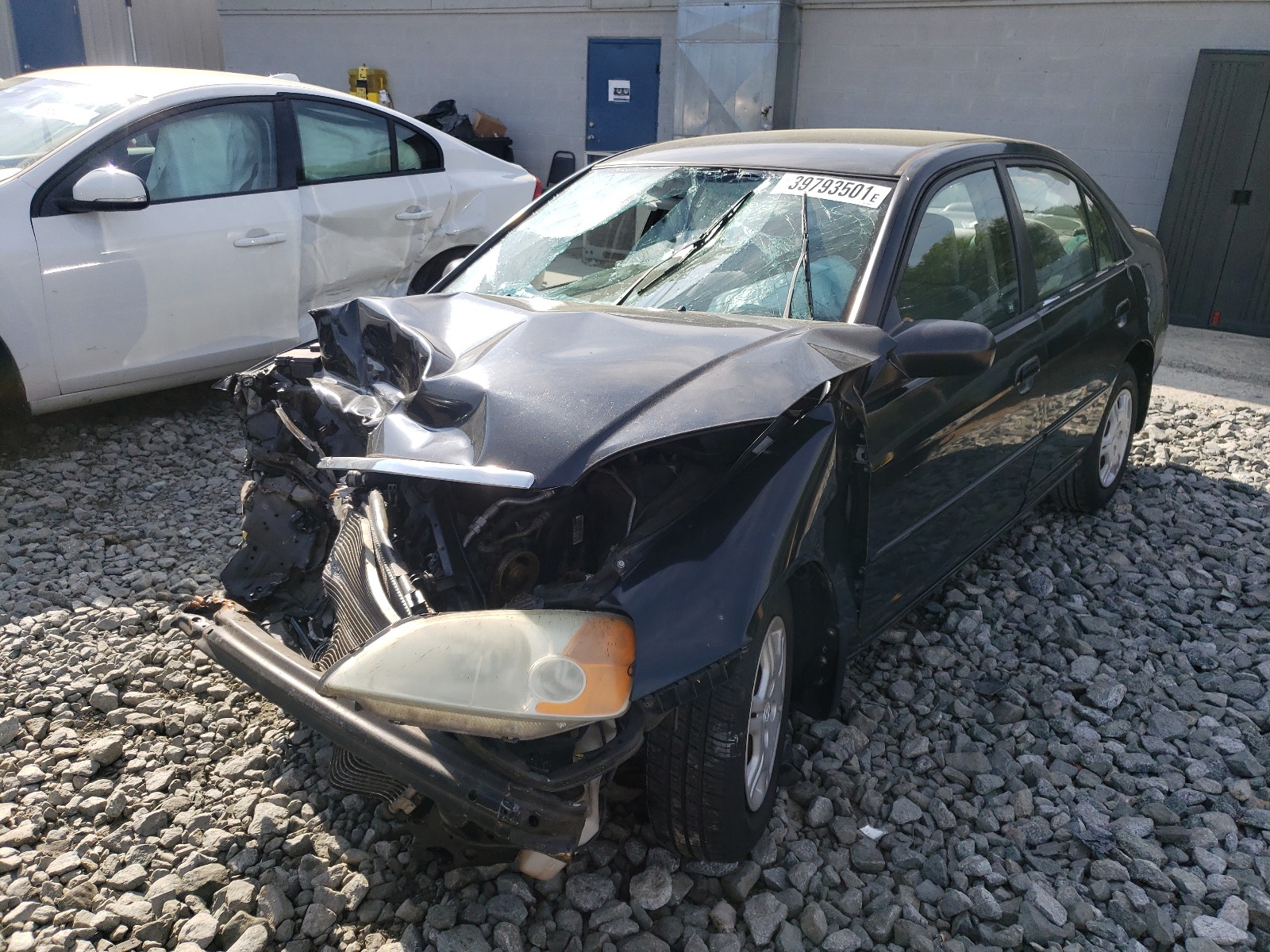 Photo 2 from auction – 2002 HONDA CIVIC LX with VIN 1HGES16562L045939