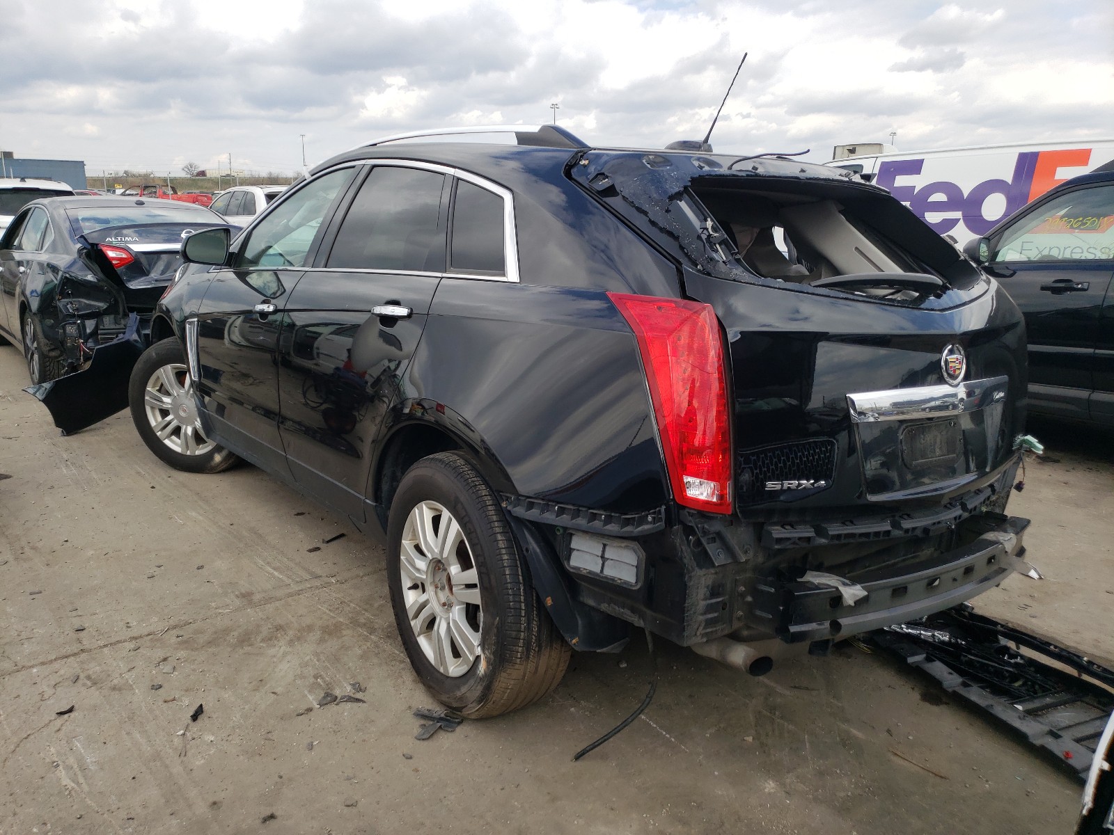 Photo 3 from auction – 2015 CADILLAC SRX LUXURY with VIN 3GYFNEE33FS580867