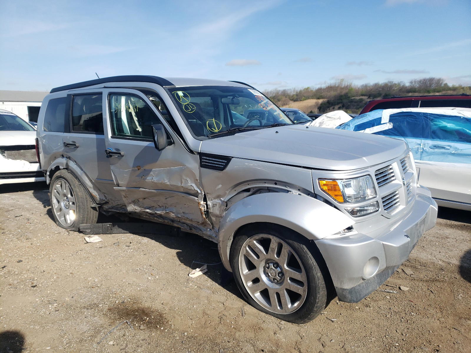 DODGE NITRO HEAT 2011 with VIN 1D4PT4GK2BW597594 - Photo from auction