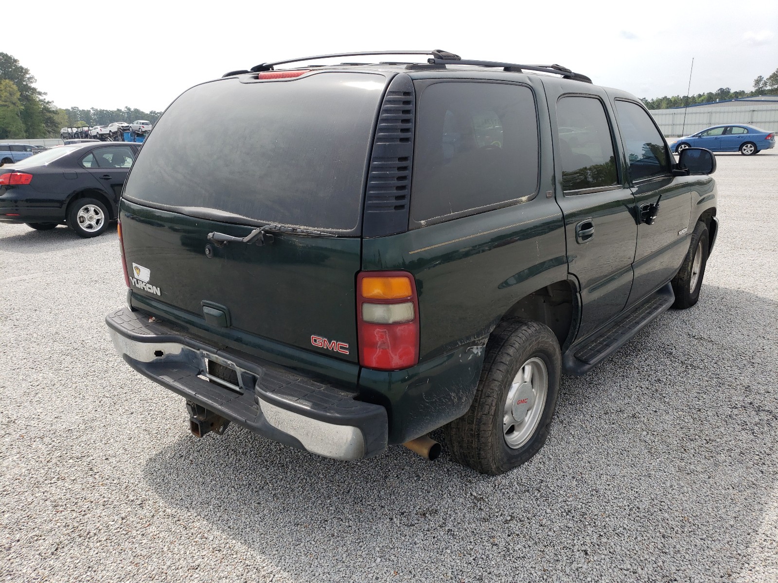 Photo 4 from auction – 2002 GMC YUKON with VIN 1GKEC13V82R236943