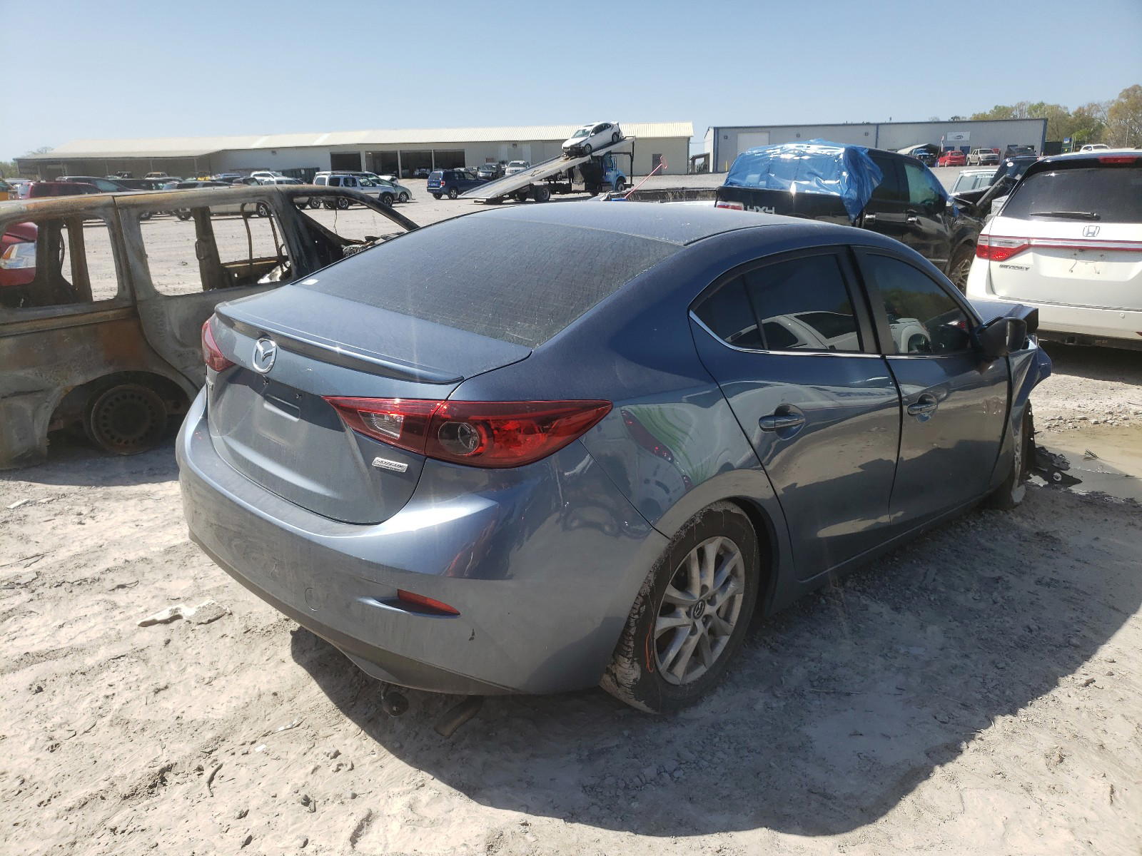 Photo 4 from auction – 2016 MAZDA 3 TOURING with VIN 3MZBM1V79GM247725