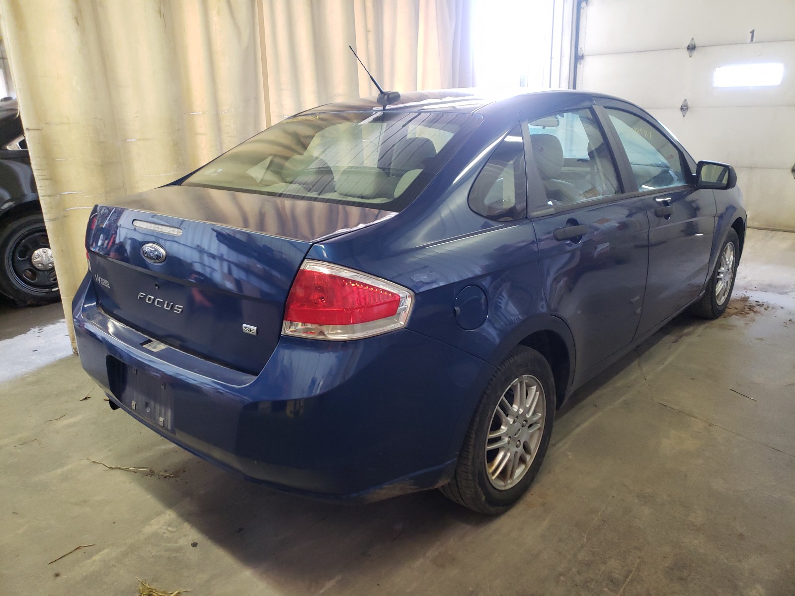 Photo 4 from auction – 2009 FORD FOCUS SE with VIN 1FAHP35N99W257226