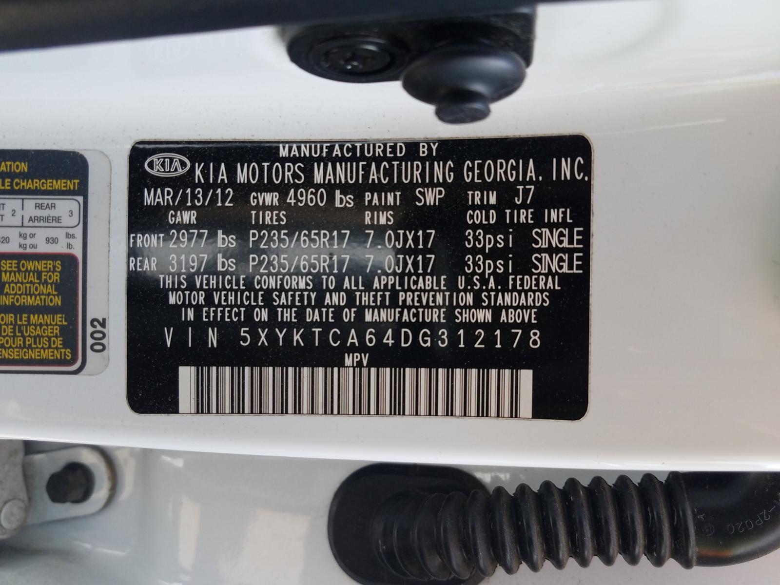 Photo 10 from auction – 2013 KIA SORENTO LX with VIN 5XYKTCA64DG312178