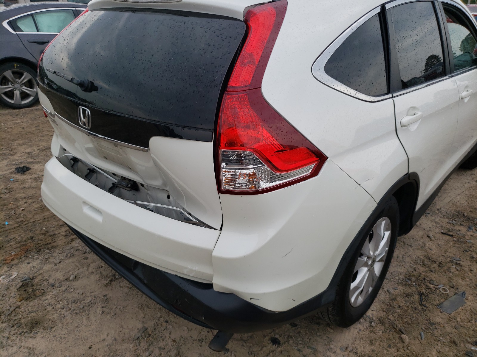 Photo 9 from auction – 2014 HONDA CR-V EXL with VIN 5J6RM3H79EL025929