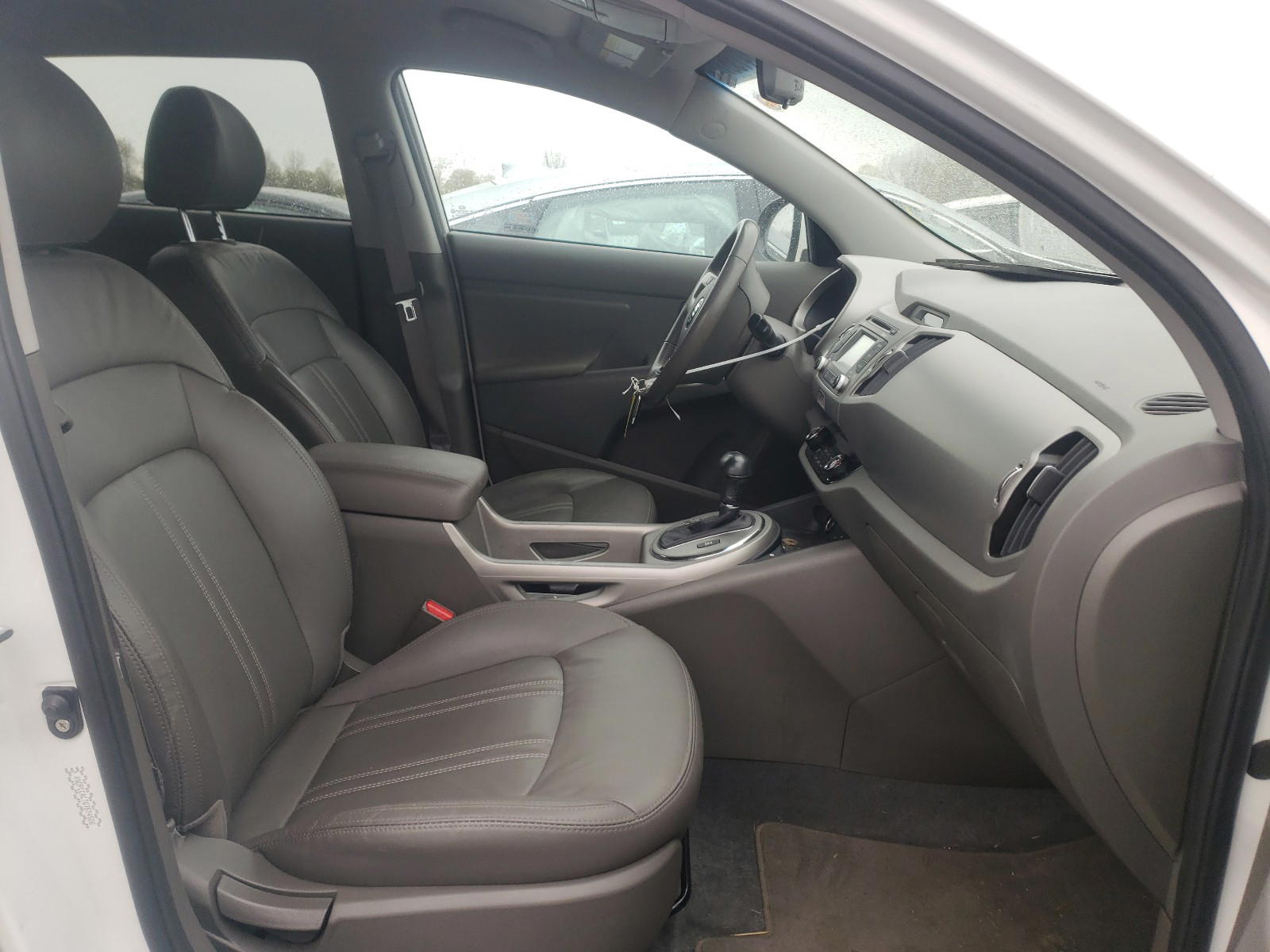 Photo 5 from auction – 2016 KIA SPORTAGE E with VIN KNDPCCAC7G7874508