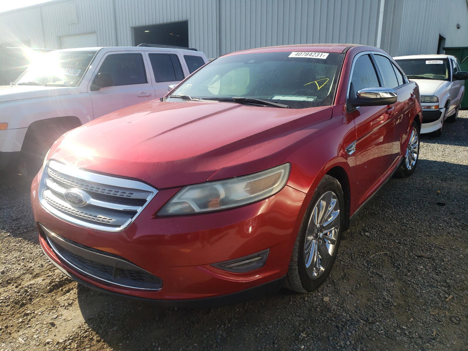 Photo 2 from auction – 2011 FORD TAURUS LIM with VIN 1FAHP2FW9BG101236
