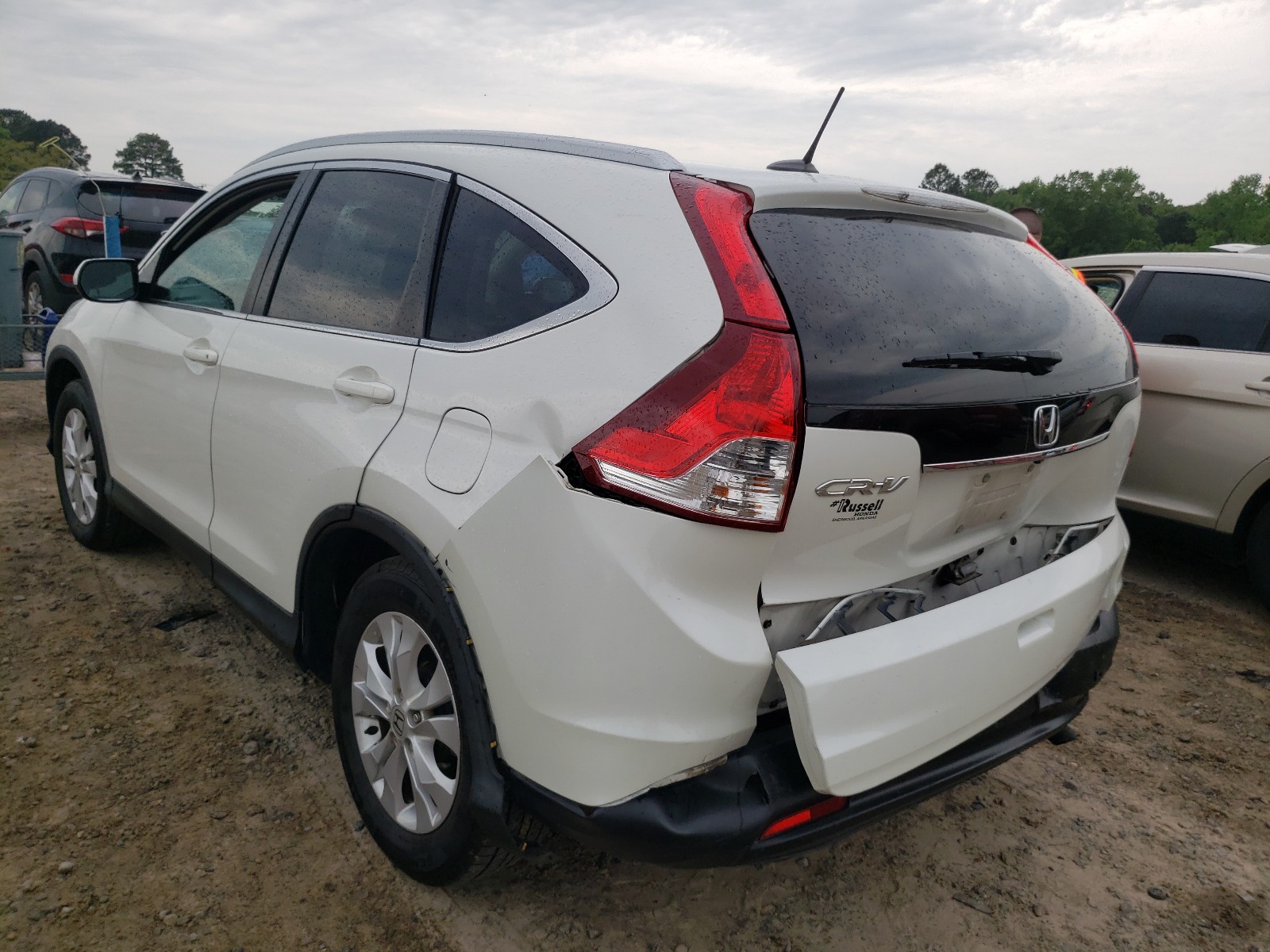 Photo 3 from auction – 2014 HONDA CR-V EXL with VIN 5J6RM3H79EL025929