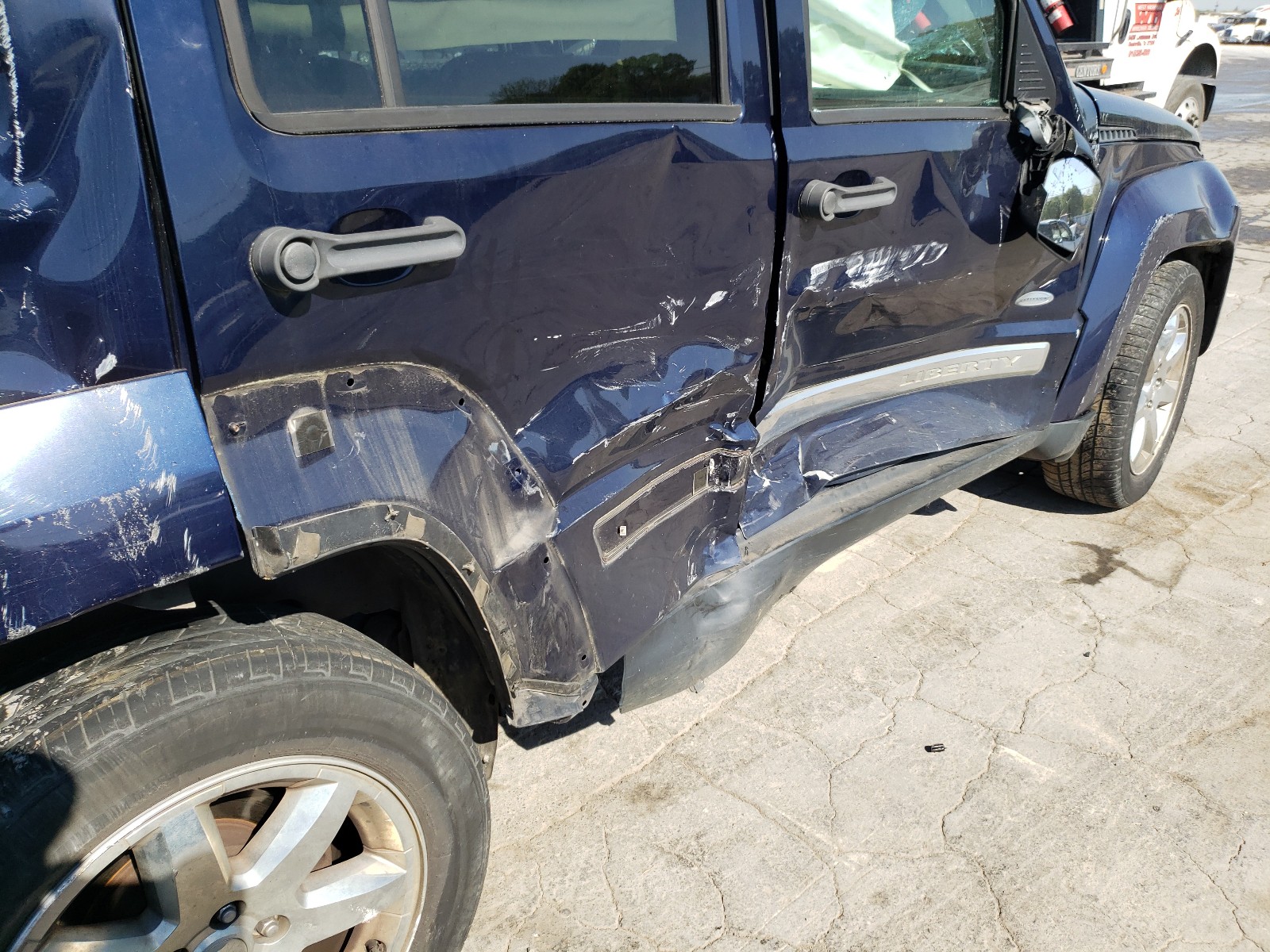 Photo 9 from auction – 2012 JEEP LIBERTY SP with VIN 1C4PJLAK2CW188647