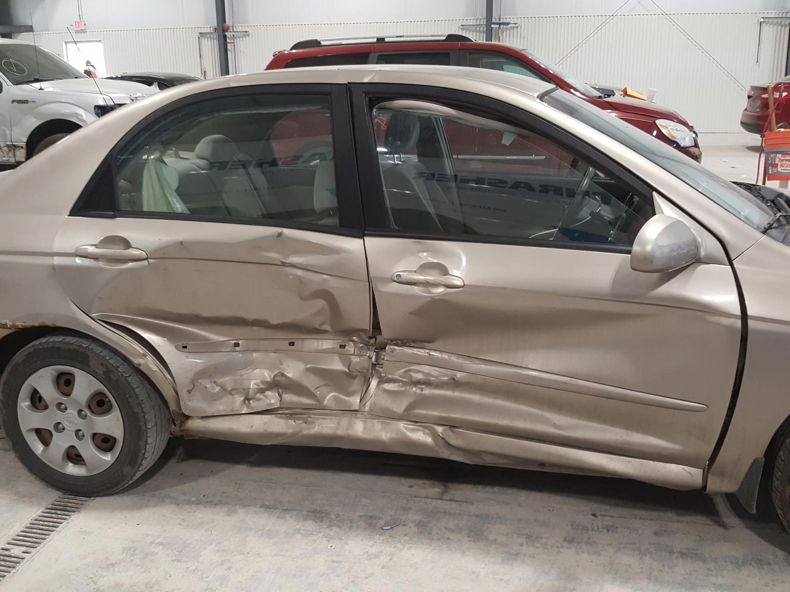 Photo 9 from auction – 2007 KIA SPECTRA EX with VIN KNAFE121475412682