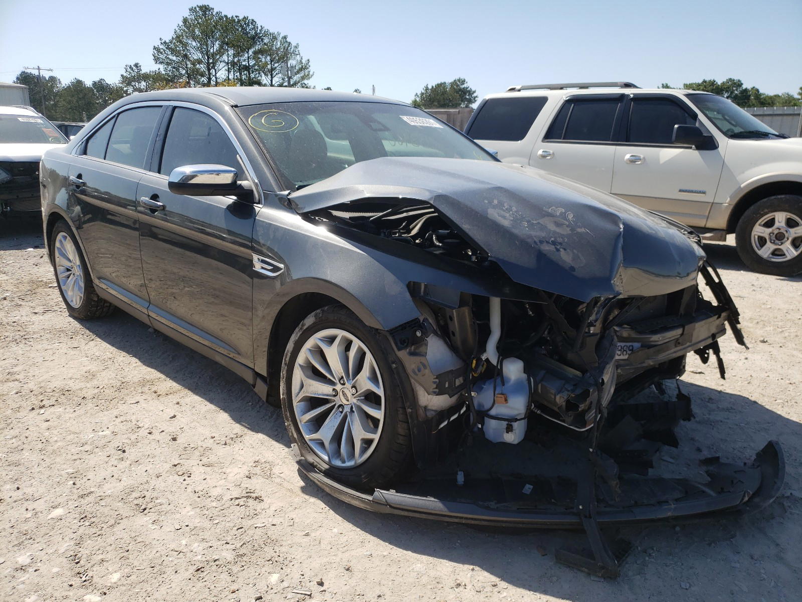 FORD TAURUS LIM 2016 with VIN 1FAHP2F86GG122943 - Photo from auction