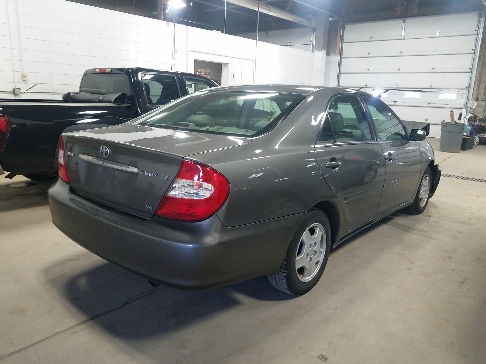 Photo 4 from auction – 2003 TOYOTA CAMRY LE with VIN 4T1BF30K13U563528