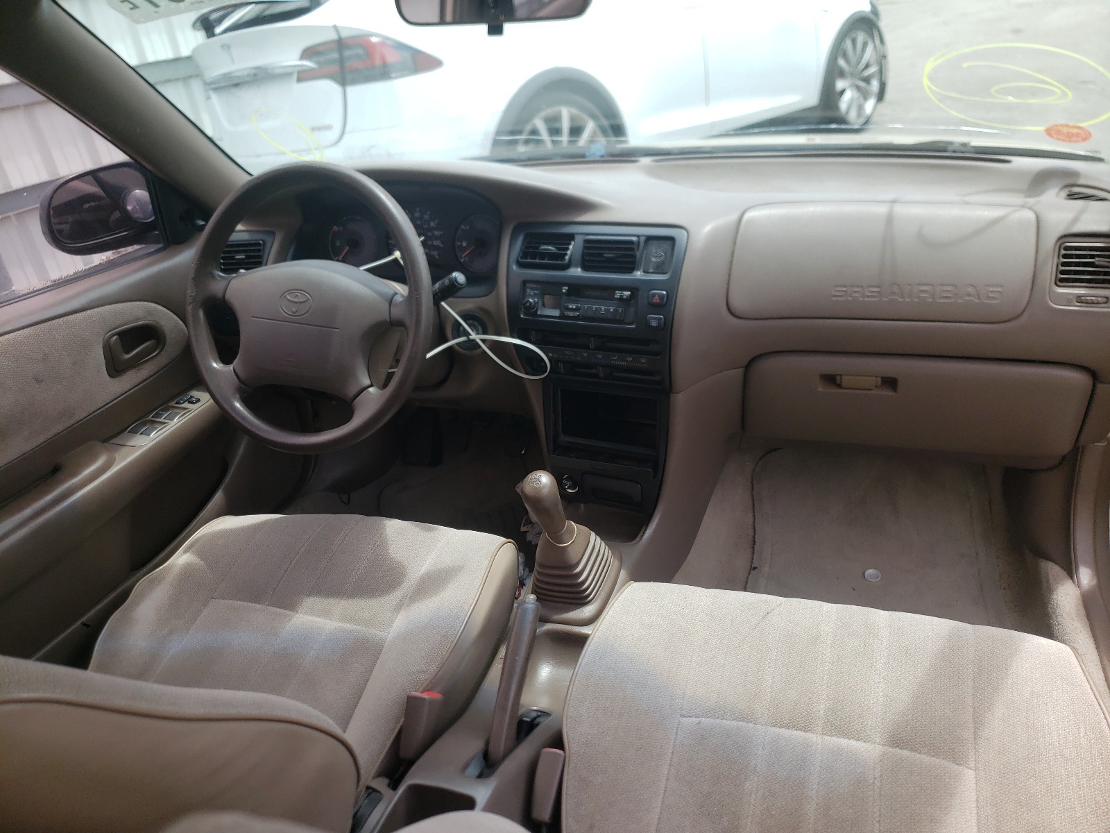 Photo 9 from auction – 1997 TOYOTA COROLLA DX with VIN 1NXBA02E2VZ612999