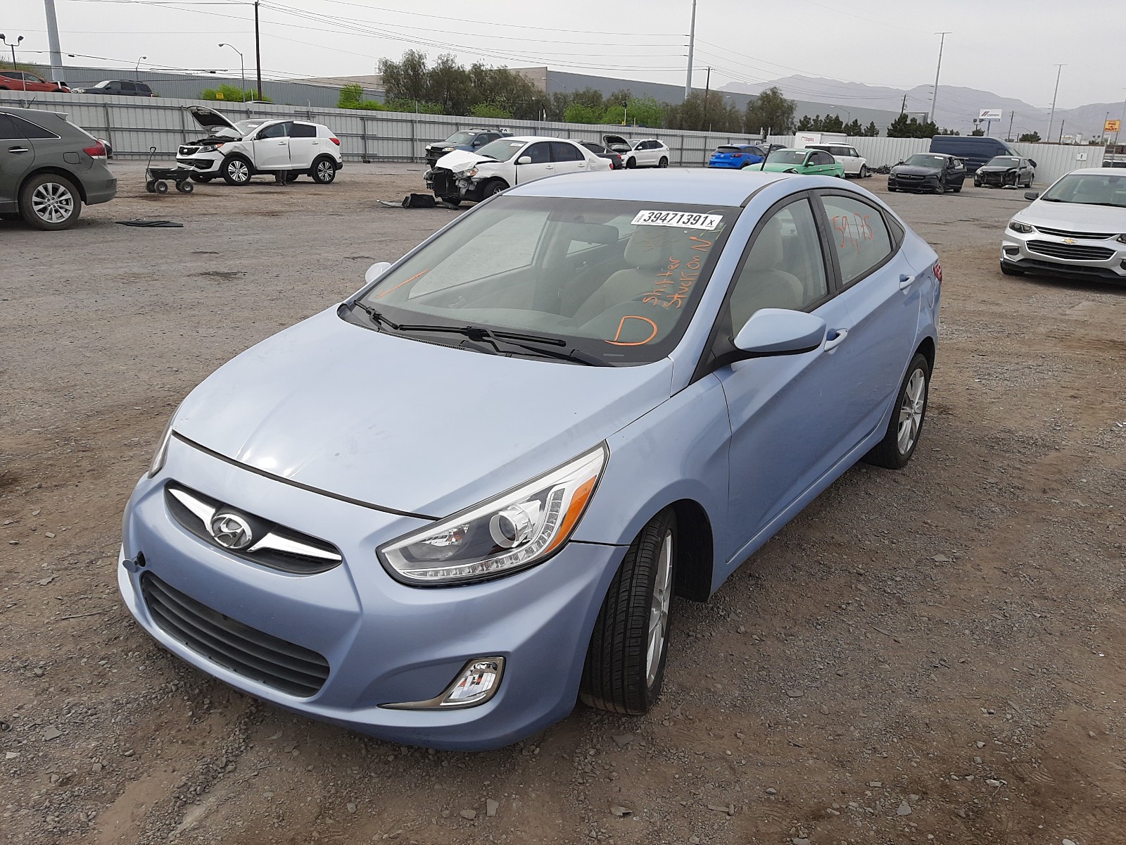 Photo 2 from auction – 2014 HYUNDAI ACCENT GLS with VIN KMHCU4AE9EU626435