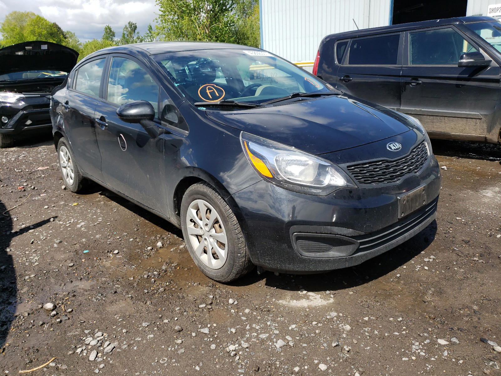 KIA RIO LX 2015 with VIN KNADM4A35F6432771 - Photo from auction