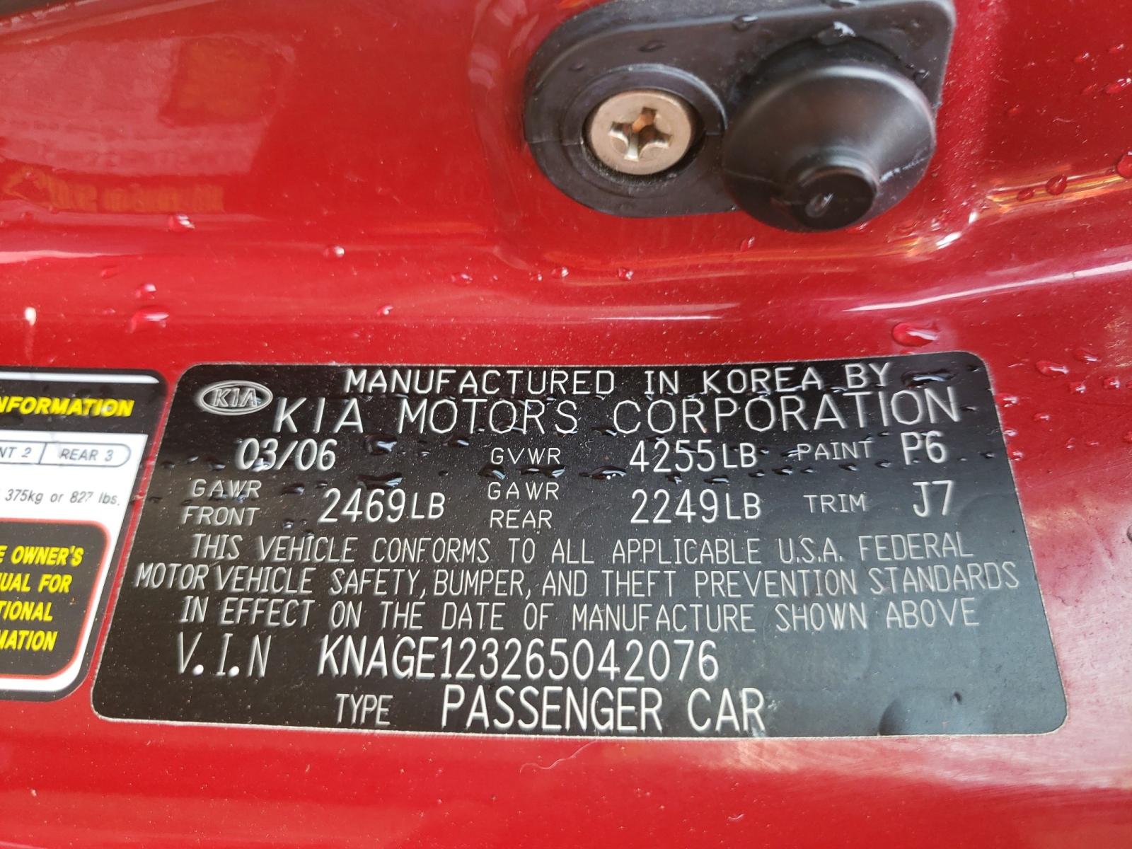 Photo 10 from auction – 2006 KIA OPTIMA LX with VIN KNAGE123265042076