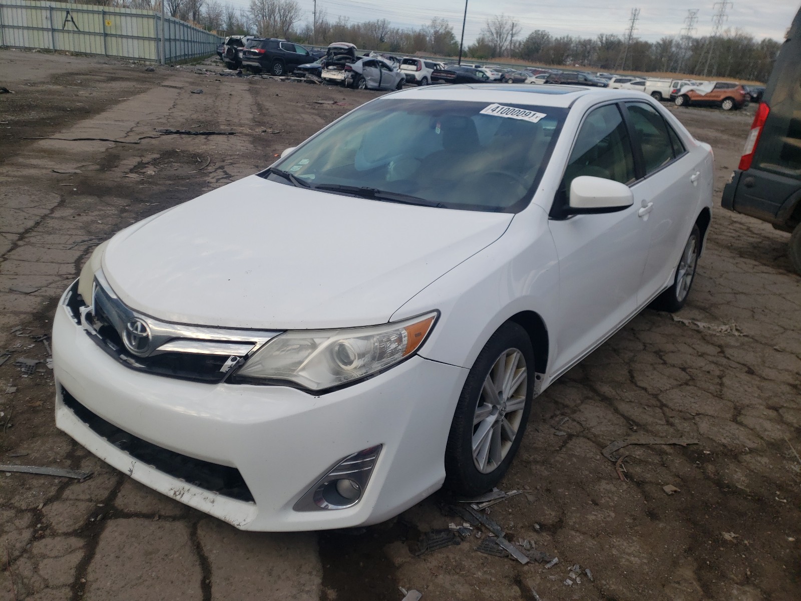Foto 2 de la subasta – 2012 TOYOTA CAMRY BASE con VIN 4T1BF1FKXCU155458