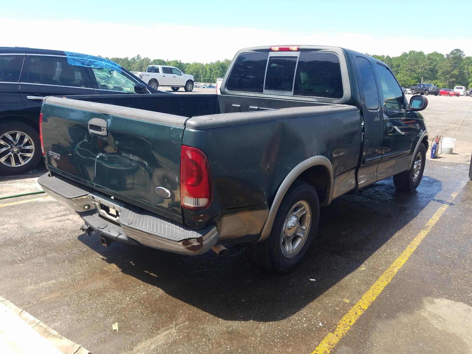 Photo 4 from auction – 2002 FORD F150 with VIN 1FTRX17WX2NA36786
