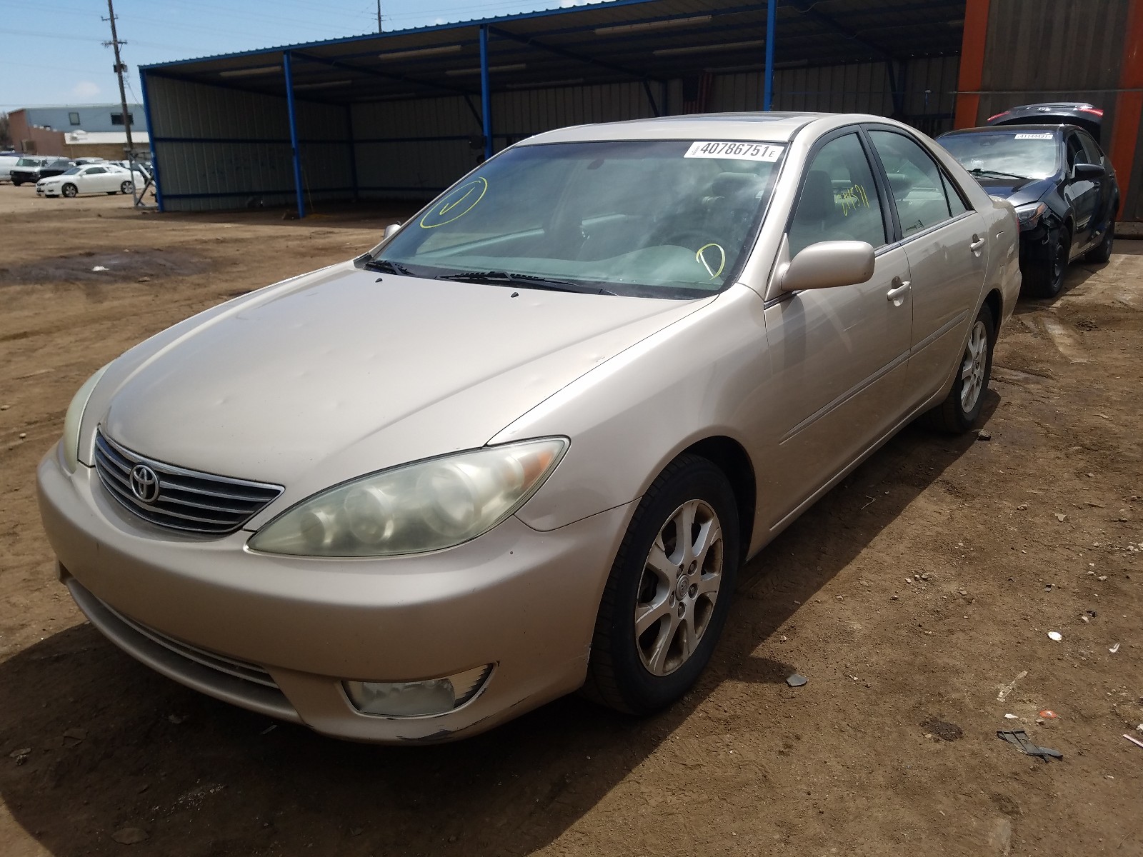 Photo 2 from auction – 2005 TOYOTA CAMRY LE with VIN 4T1BF30K75U591112