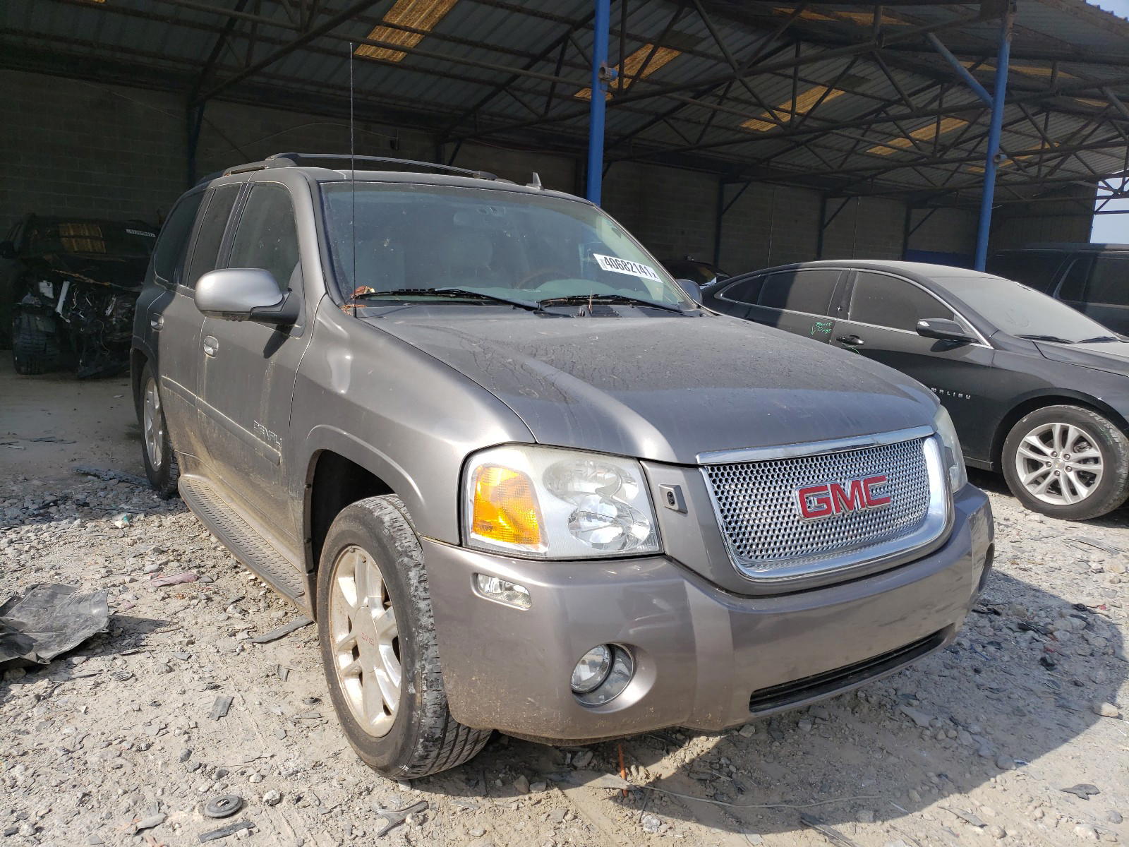 GMC ENVOY 2006 with VIN 1GKES63M562220480 - Photo from auction