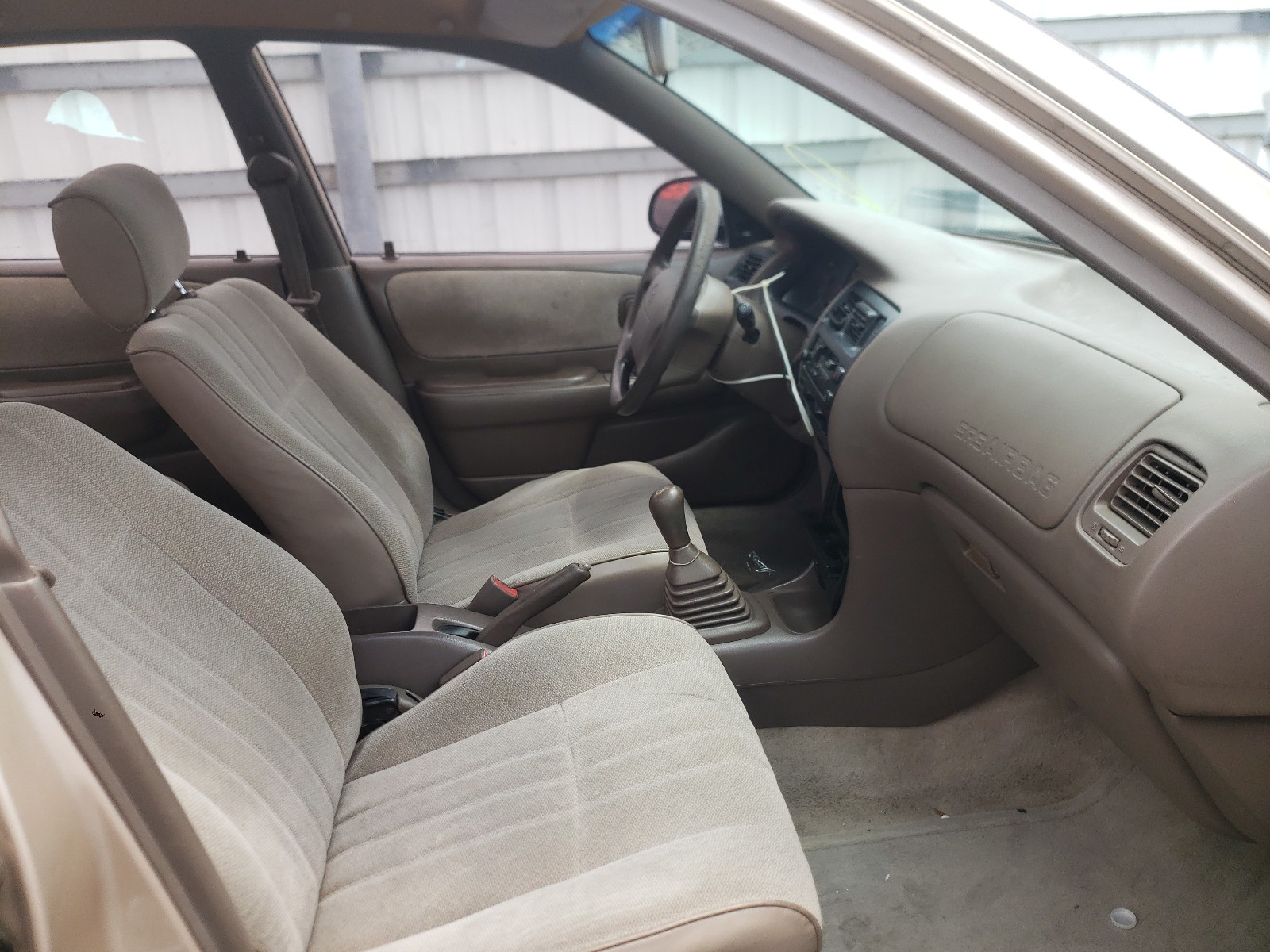 Photo 5 from auction – 1997 TOYOTA COROLLA DX with VIN 1NXBA02E2VZ612999