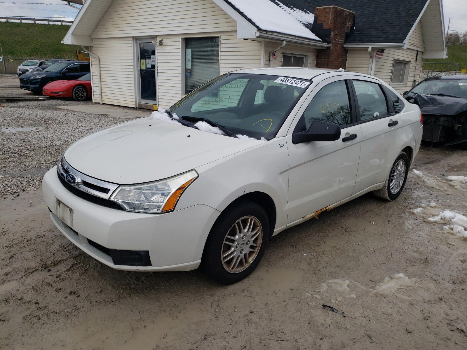 Photo 2 from auction – 2011 FORD FOCUS SE with VIN 1FAHP3FN5BW122216