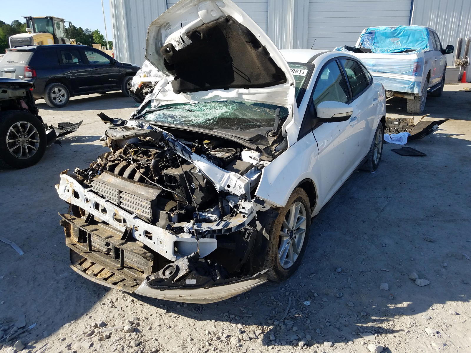 Photo 2 from auction – 2016 FORD FOCUS SE with VIN 1FADP3F23GL224028