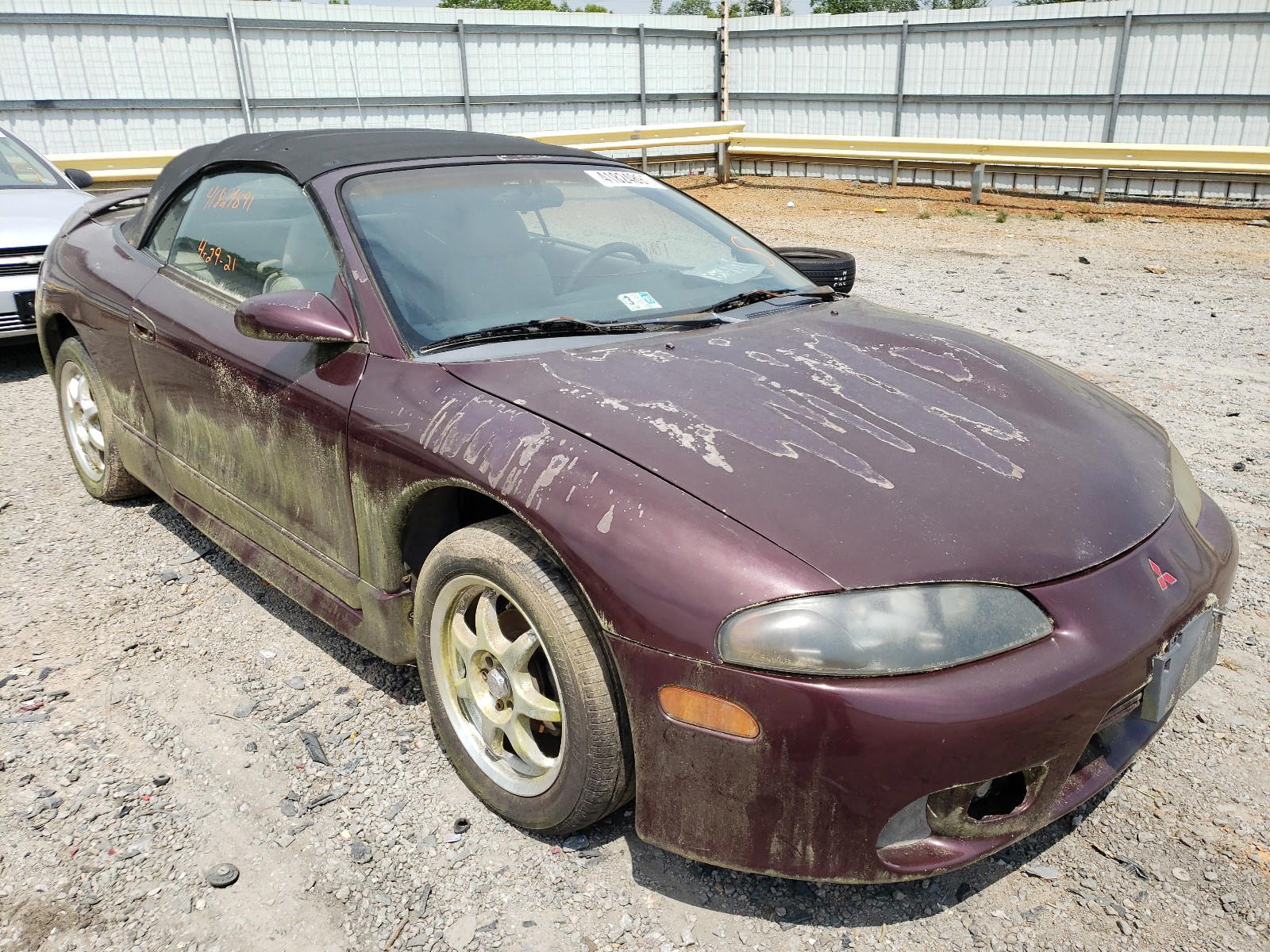 MITSUBISHI ECLIPSE SP 1999 with VIN 4A3AX35G5XE085581 - Photo from auction