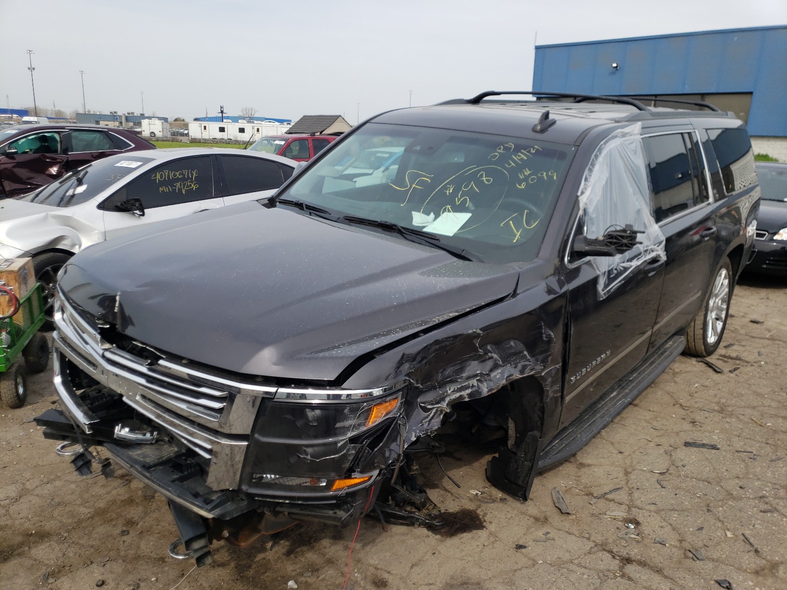 Photo 2 from auction – 2016 CHEVROLET SUBURBAN K with VIN 1GNSKHKC0GR346099