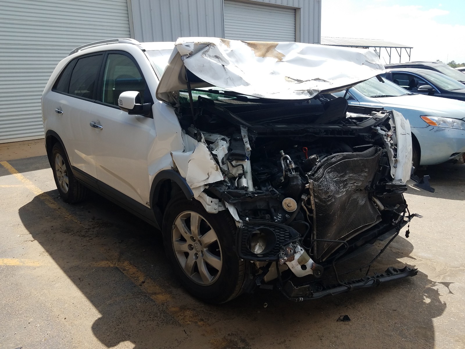 Photo 1 from auction – 2013 KIA SORENTO LX with VIN 5XYKTCA64DG312178