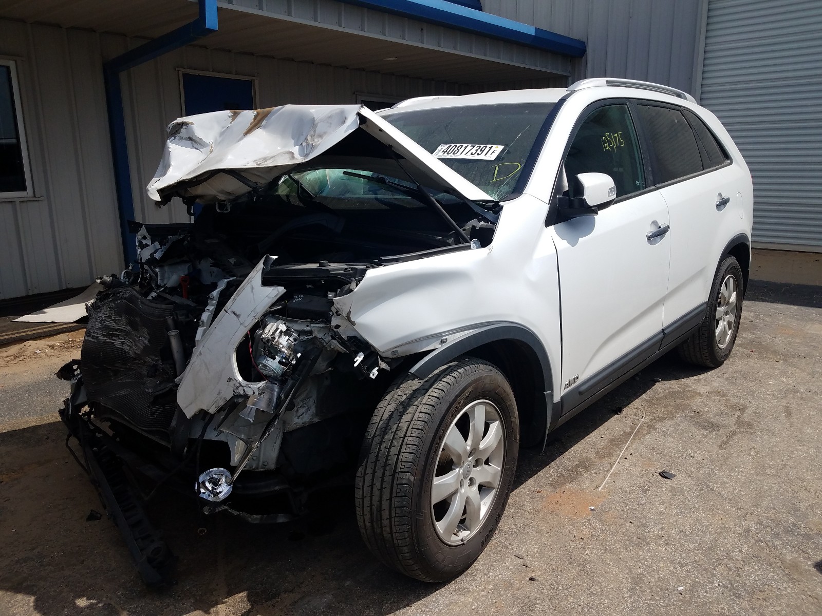 Photo 2 from auction – 2013 KIA SORENTO LX with VIN 5XYKTCA64DG312178