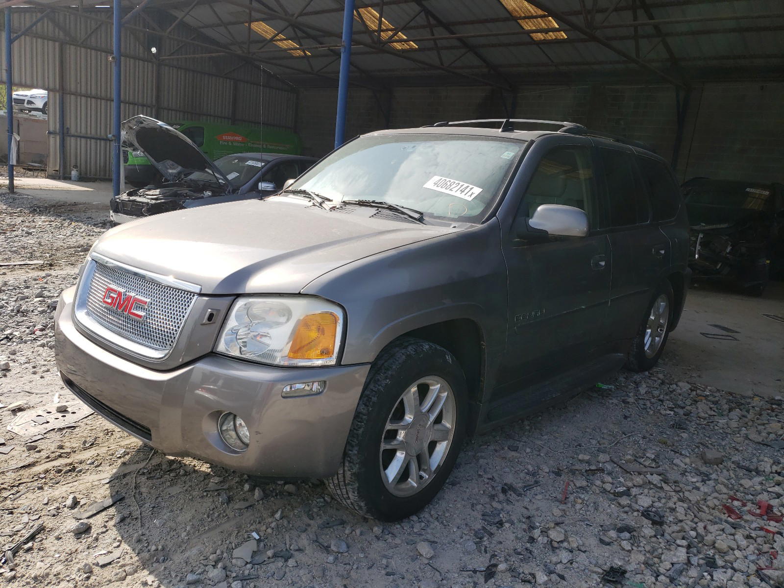 Photo 2 from auction – 2006 GMC ENVOY with VIN 1GKES63M562220480