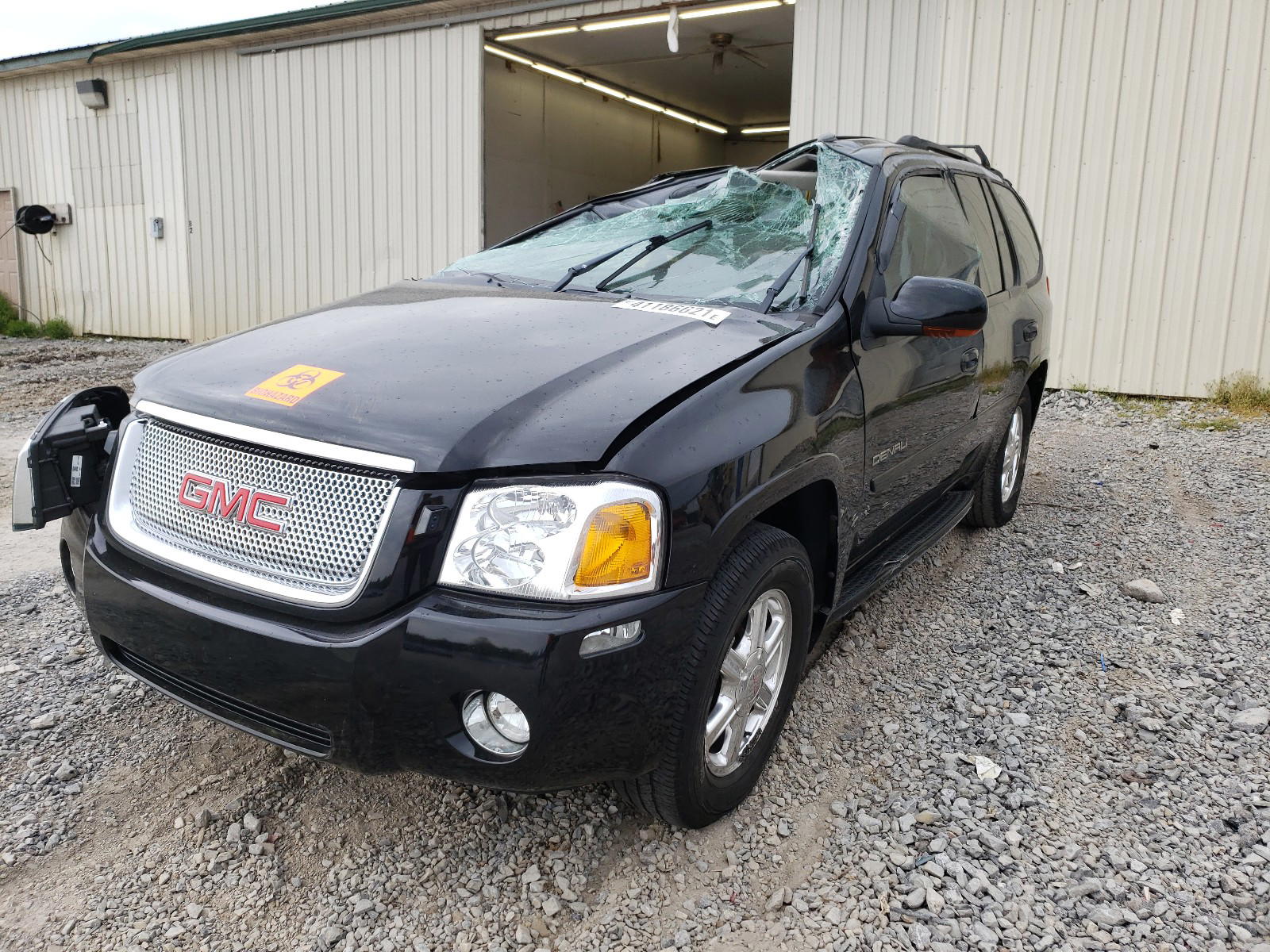 Photo 2 from auction – 2005 GMC YUKON with VIN 1GKET63M052353661