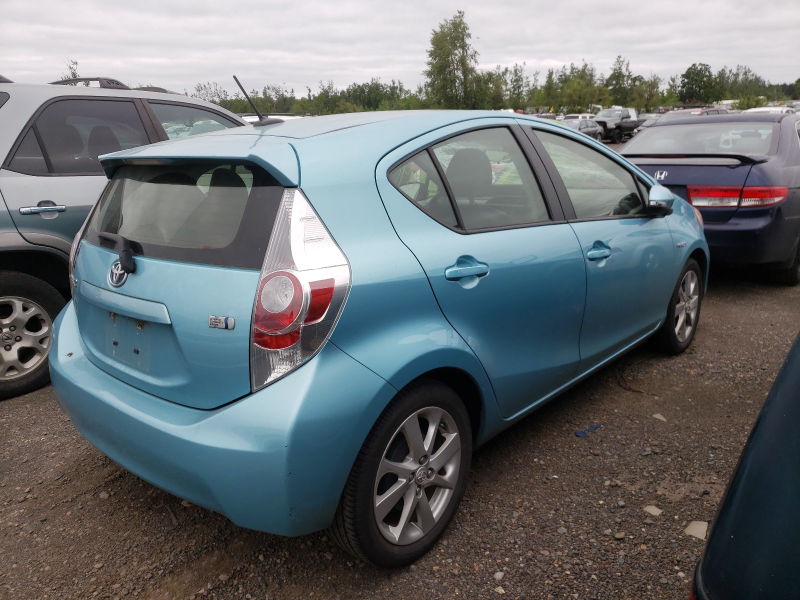 Photo 4 from auction – 2013 TOYOTA PRIUS C with VIN JTDKDTB33D1047920