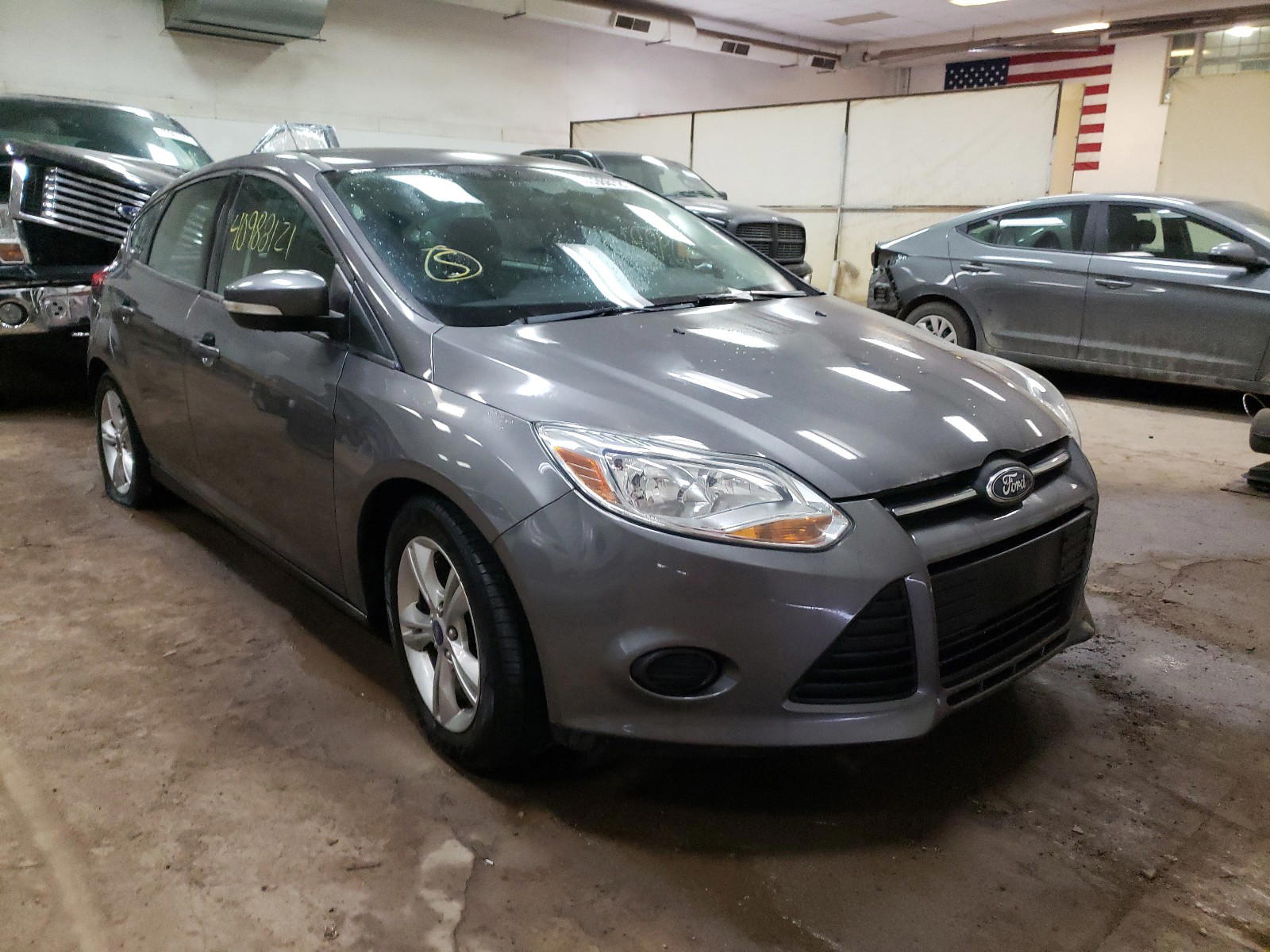 FORD FOCUS SE 2014 with VIN 1FADP3K2XEL206984 - Photo from auction
